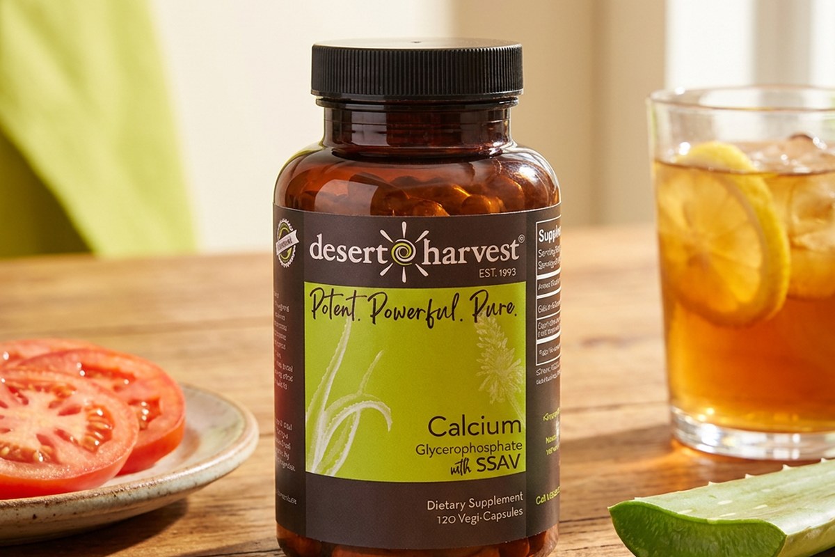 Desert Harvest Calcium Glycerophosphate capsules beside a summer meal setting